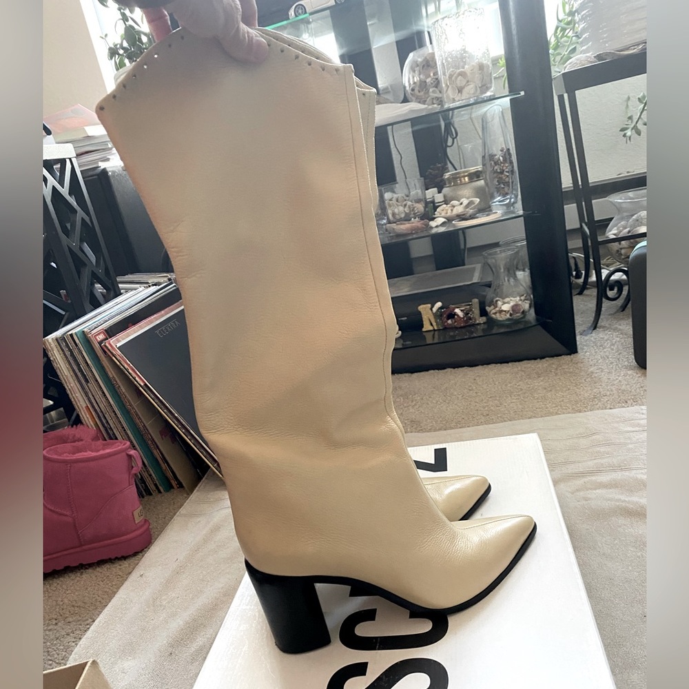 Like new worn once SCHUTZ off-white slouchy mid calf boots with pierced detail.